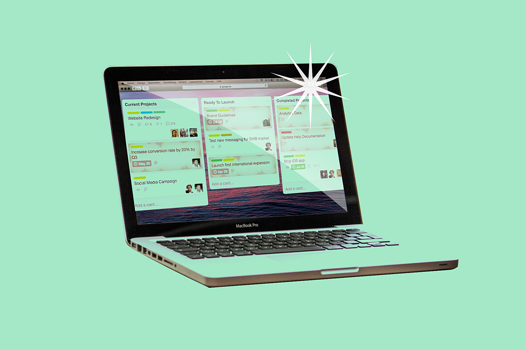 trello-project-management-for-marketing-agencies A MacBook Pro laptop displaying Trello boards with task columns under categories like "Current Projects," "Ready to Launch," and "Completed Projects," set against a mint green background.